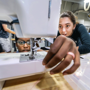 Two women use sewing machine in a Carolina's makerspace